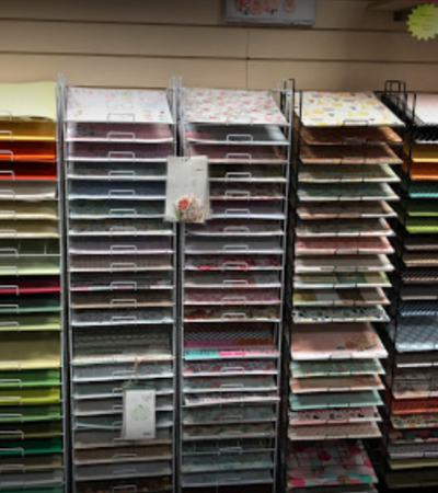 Stacks of different coloured sheets of card