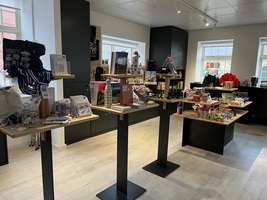 Gift shop showing books, toys and items for sale