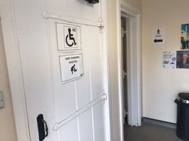 Door showing accessible toilets and baby change facilities