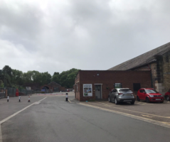 Car park with accessible spaces and entrance to the back of Elsecar Heritage Centre